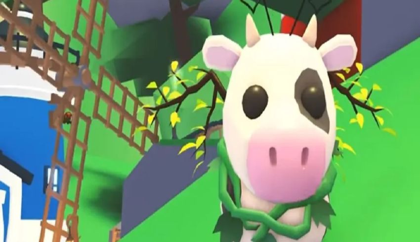 A cartoon cow is standing in front of a house.