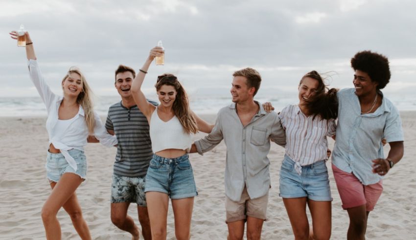 Group of friends having fun on the beach.