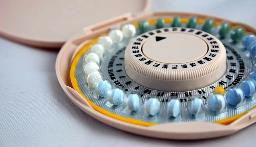 An image of a contraceptive pill in a plastic container.