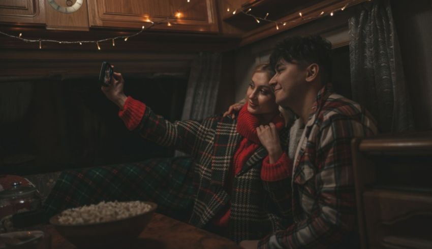A couple taking a selfie in their rv.