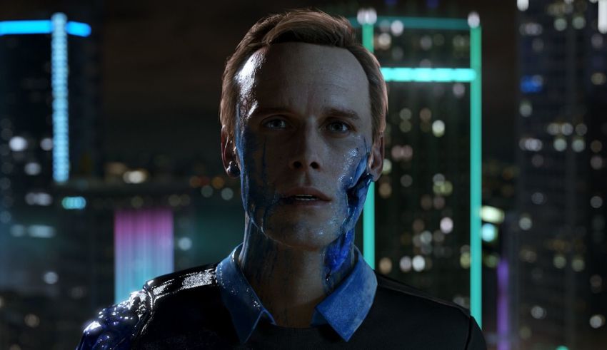 A man with blue paint on his face in front of a city.