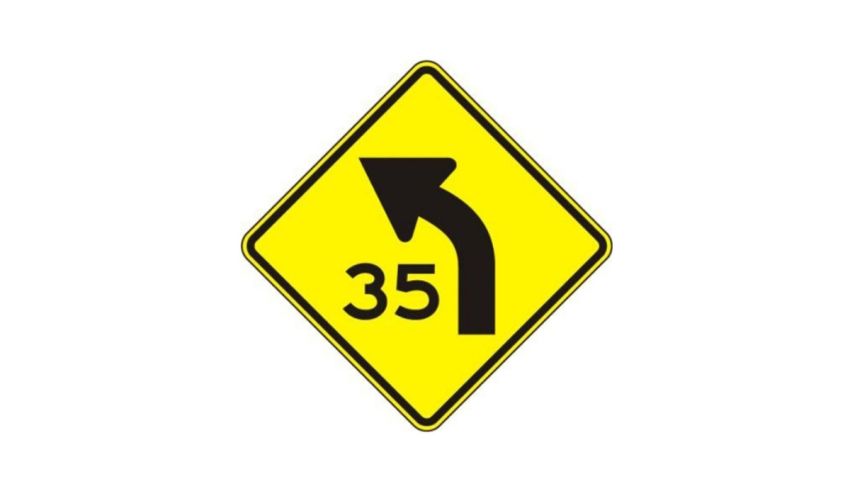 A yellow and black sign with the number 35 on it.