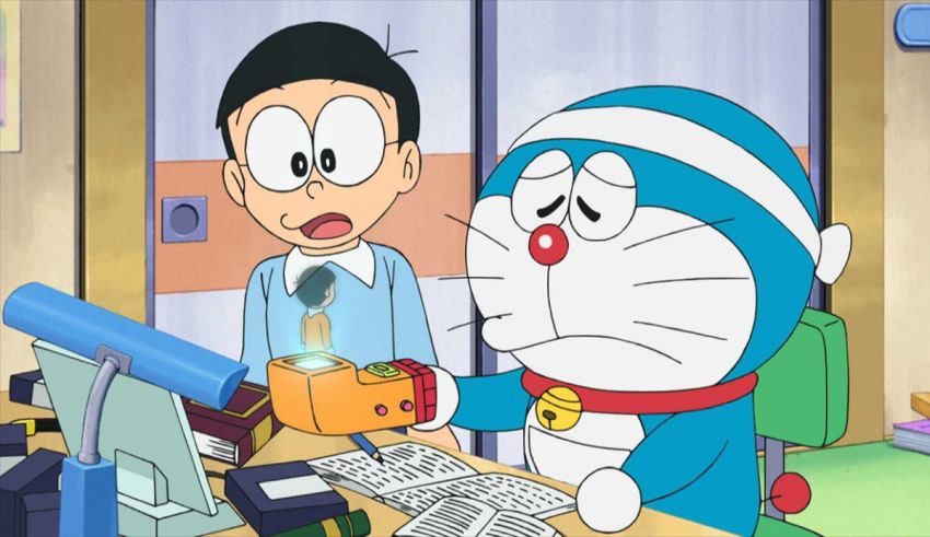 Doraemon and a boy sitting at a desk.