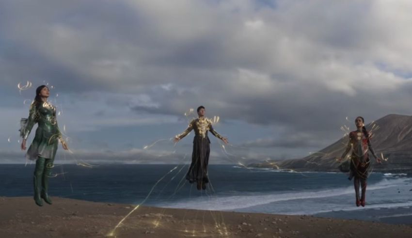 A group of women are flying over the ocean.