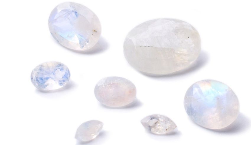 A variety of moonstones on a white background.