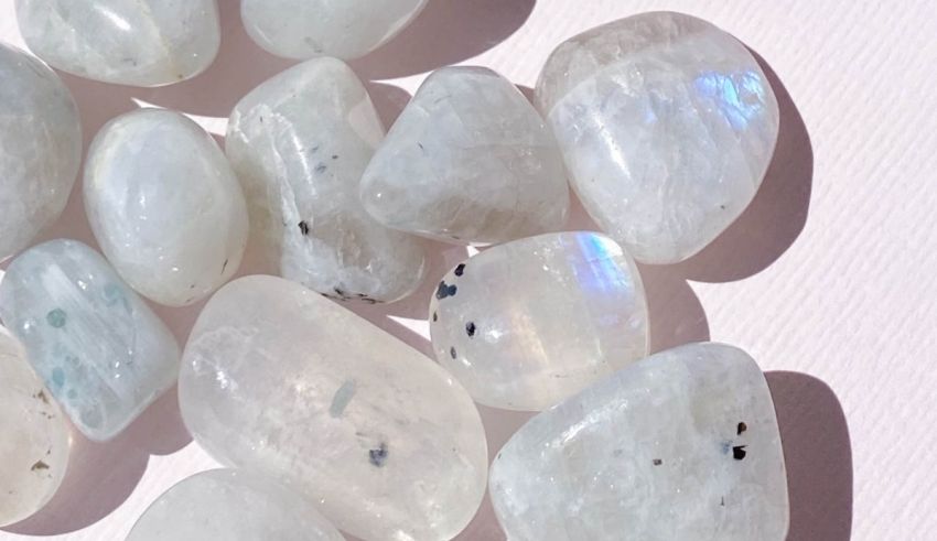 A group of white stones on a white surface.