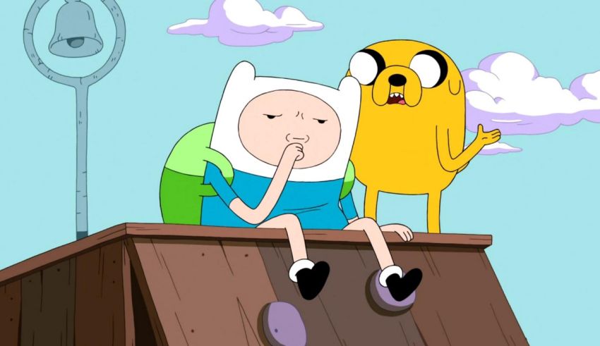 Finn and finn are sitting on top of a wooden platform.