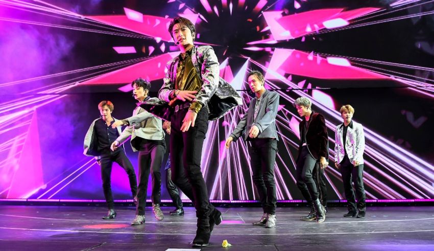 A group of korean boys performing on stage.