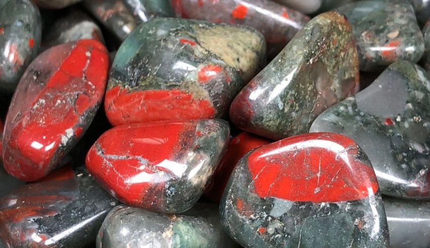 A pile of green, red and black stones.