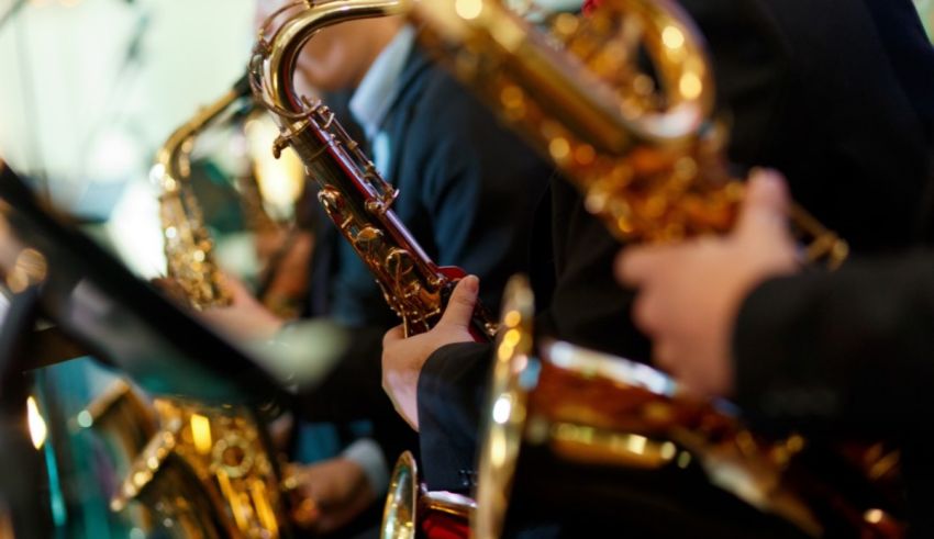 A group of musicians playing saxophones.