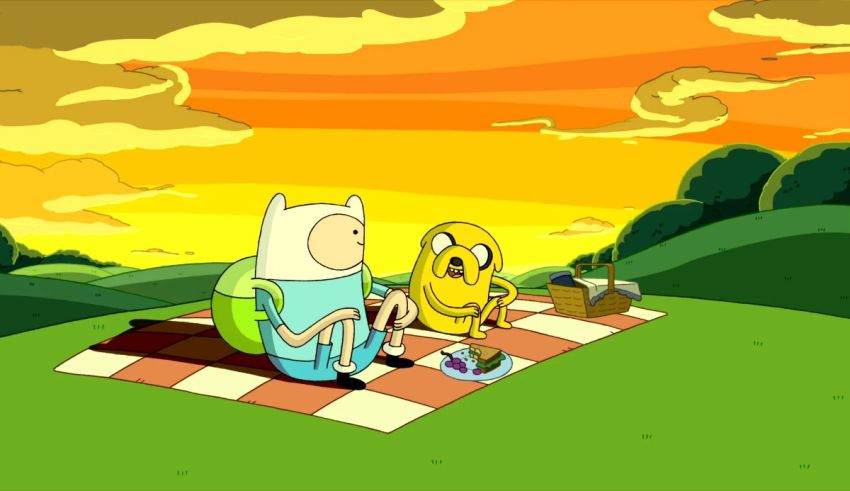 Adventure time finn and finny sitting on a picnic blanket.