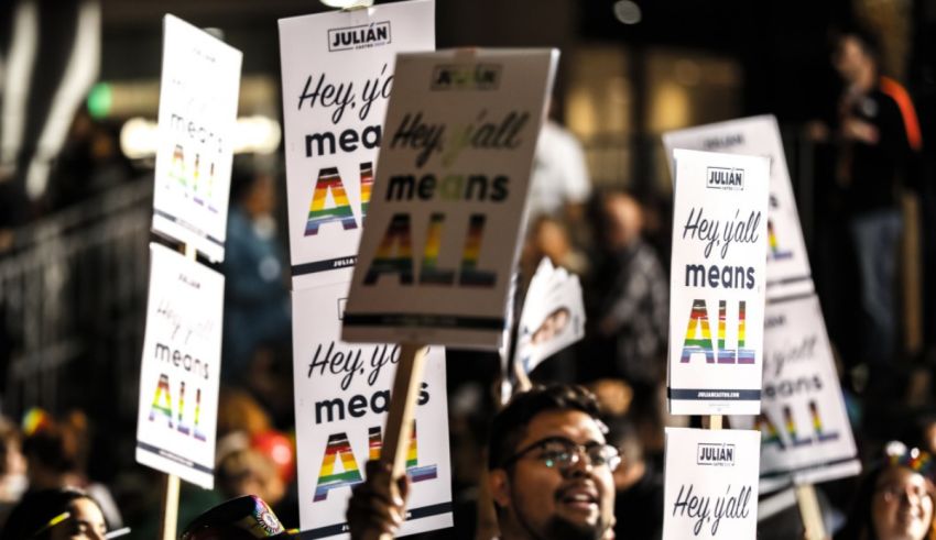 A group of people holding signs with the words happy mccain's all.