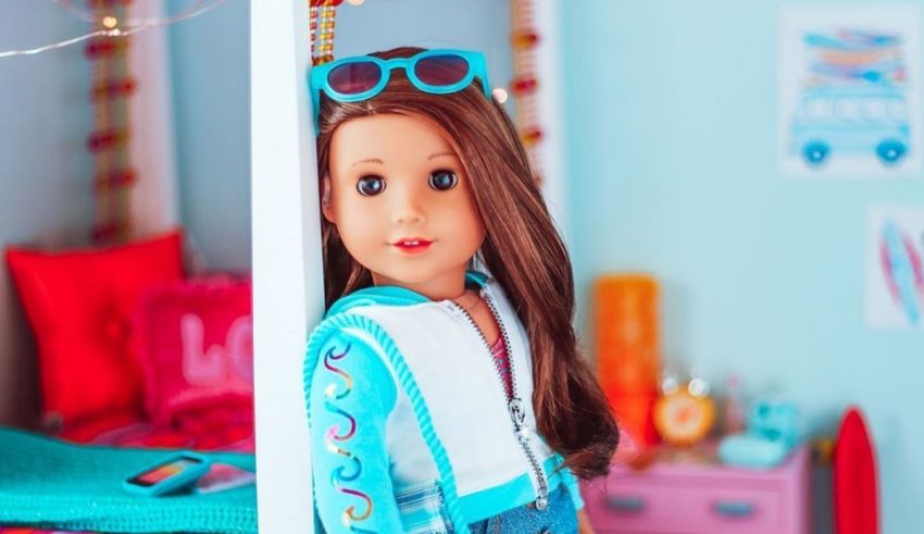 An american girl doll is standing in a bedroom.