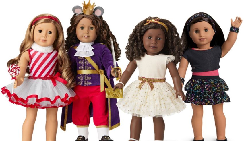 A group of american girl dolls dressed in different costumes.