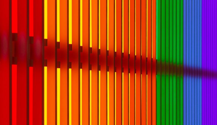 An abstract image of a rainbow colored line.