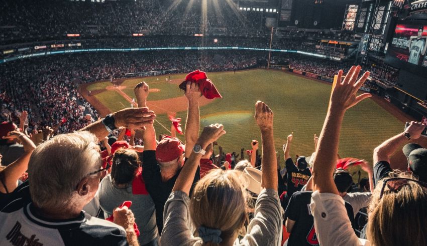 Fans cheering at a baseball game.