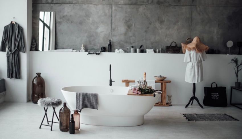 A white bathroom with a large tub.