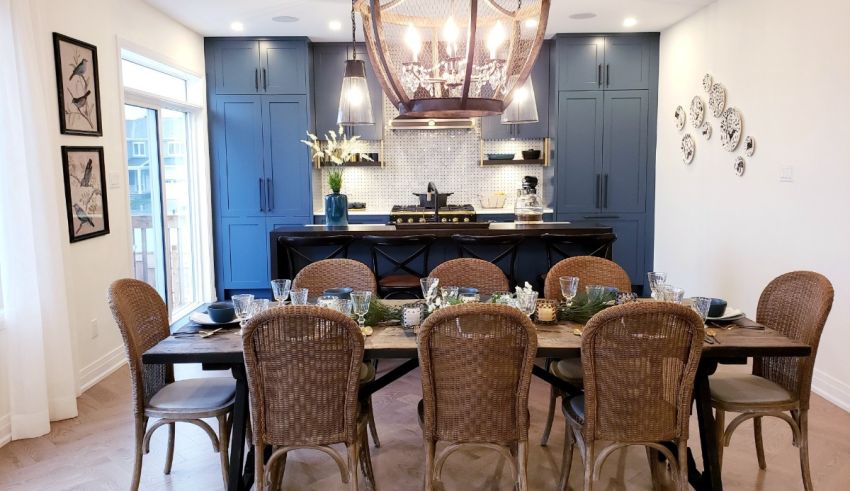 A dining table with chairs and a chandelier.