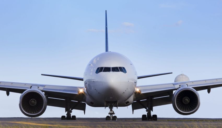 A large airplane is on the runway.