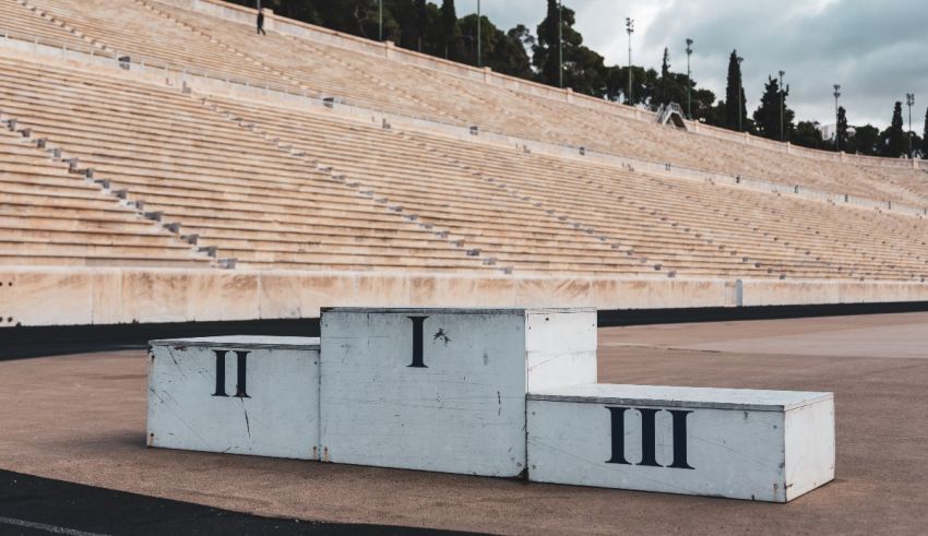 An empty stadium with a podium in front of it.