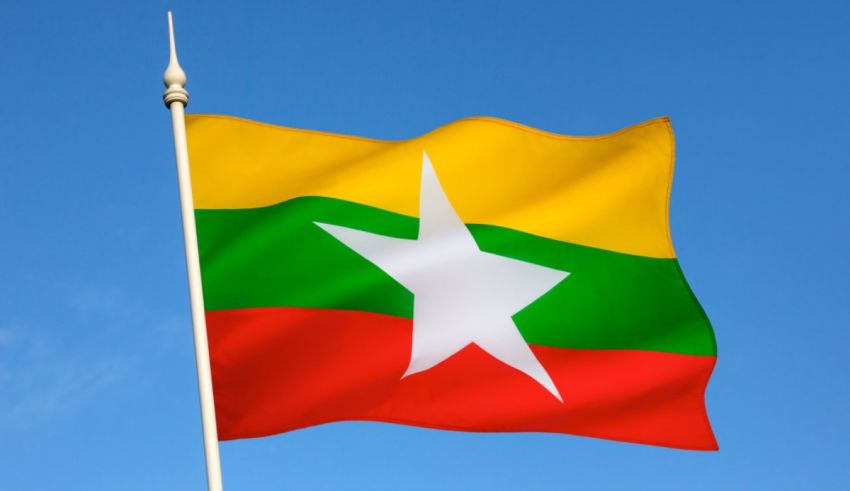 The flag of myanmar waving in the wind.