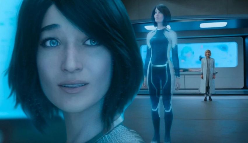 A woman is standing next to a woman in a futuristic setting.