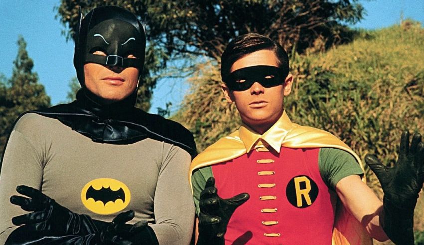 Two men dressed as batman and robin.