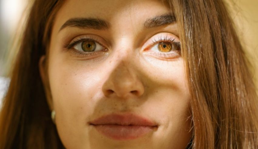 A close up of a woman with brown eyes.