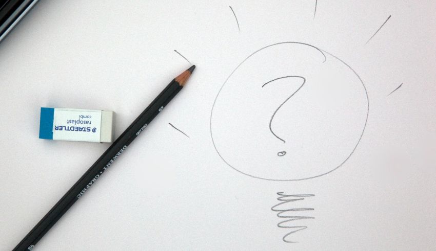 A pencil drawing a question mark next to a light bulb.