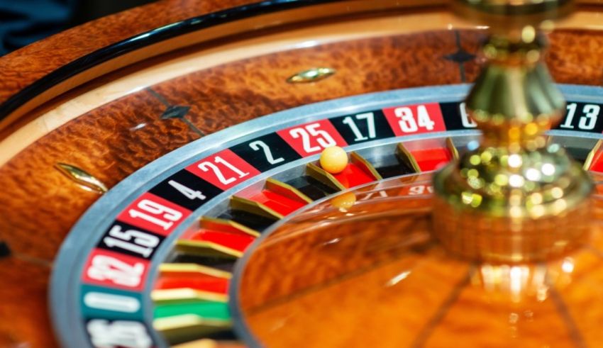 A close up of a roule wheel in a casino.