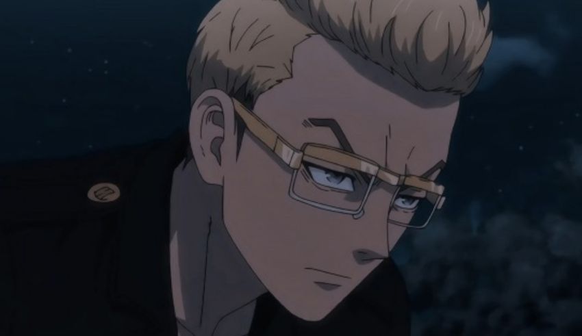 An anime character with glasses and blond hair.