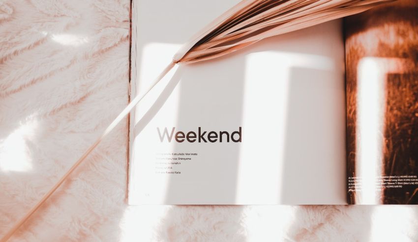 A magazine with the word weekend on it.