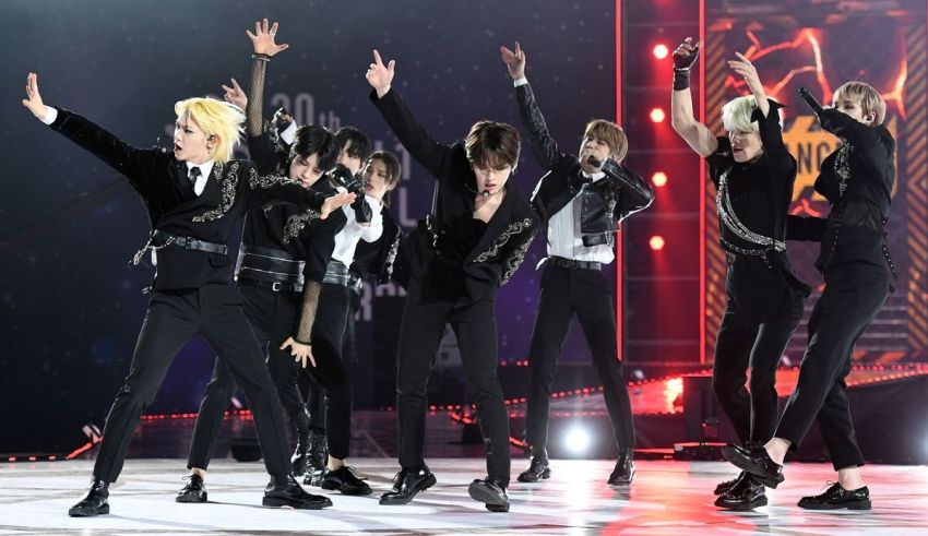 A group of korean boys performing on stage.