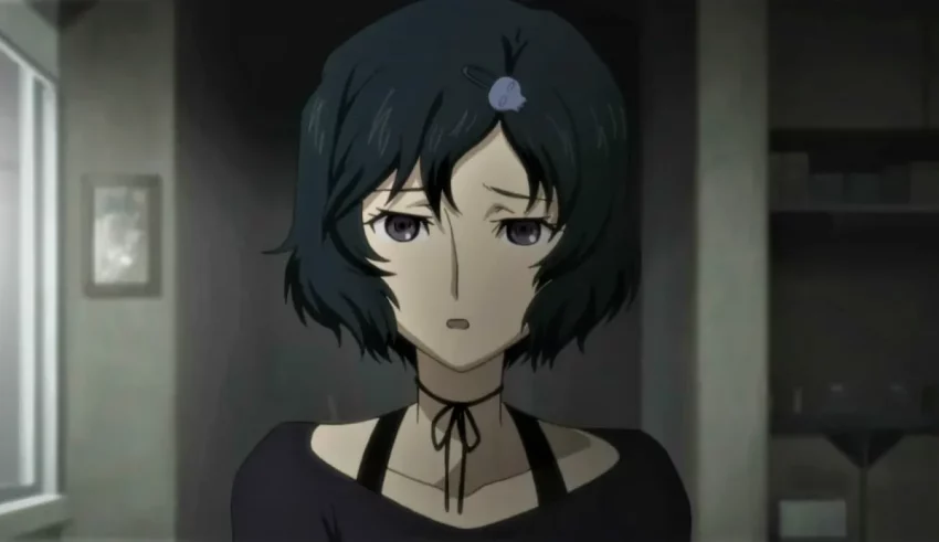 An anime girl with black hair in a dark room.