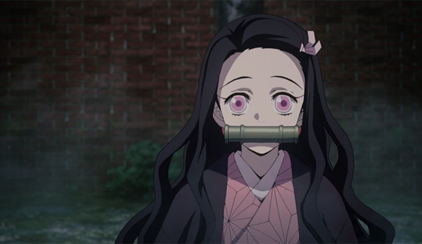 An anime girl with long hair and pink eyes.