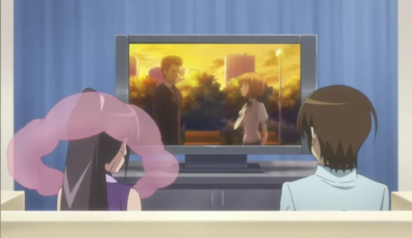 Two people sitting in front of a tv watching anime.