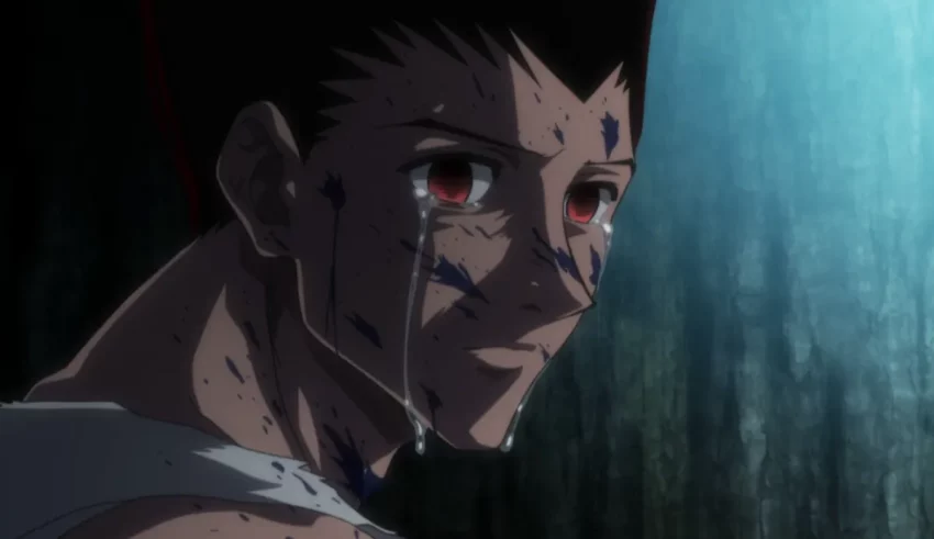 An anime character with blood on his face.