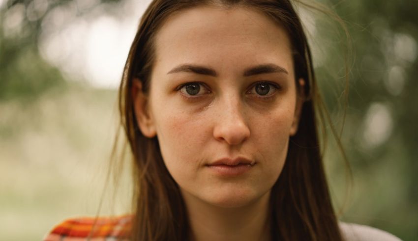 A close up of a young woman staring at the camera.