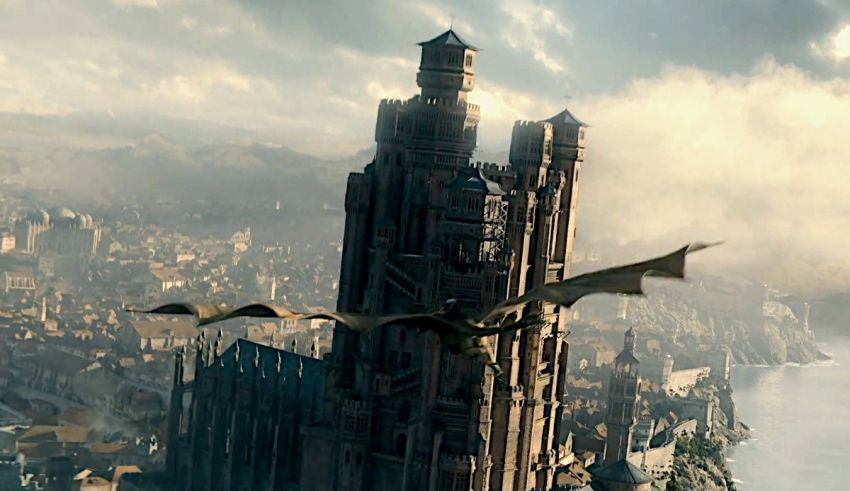 A dragon flies over a castle in game of thrones.