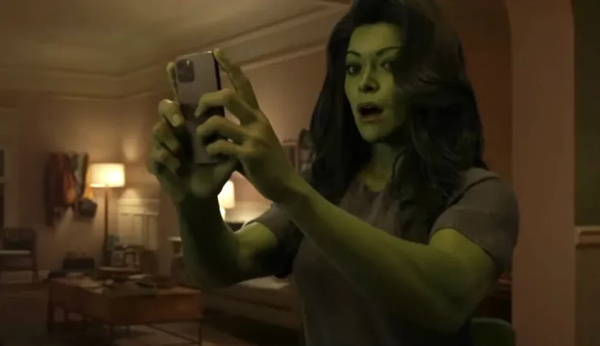 The hulk takes a selfie in a living room.