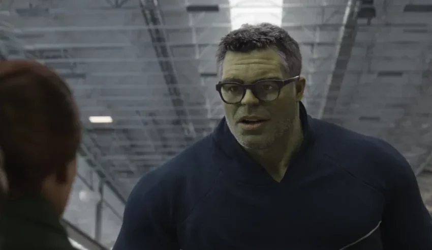 The hulk is talking to a woman in glasses.