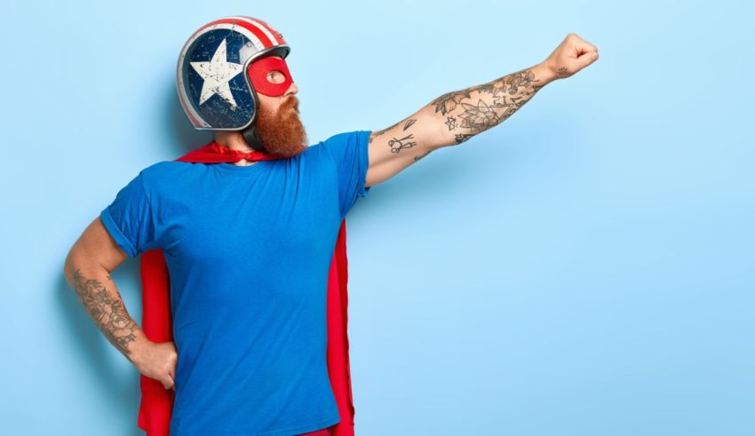 A man with a beard wearing a superhero costume.