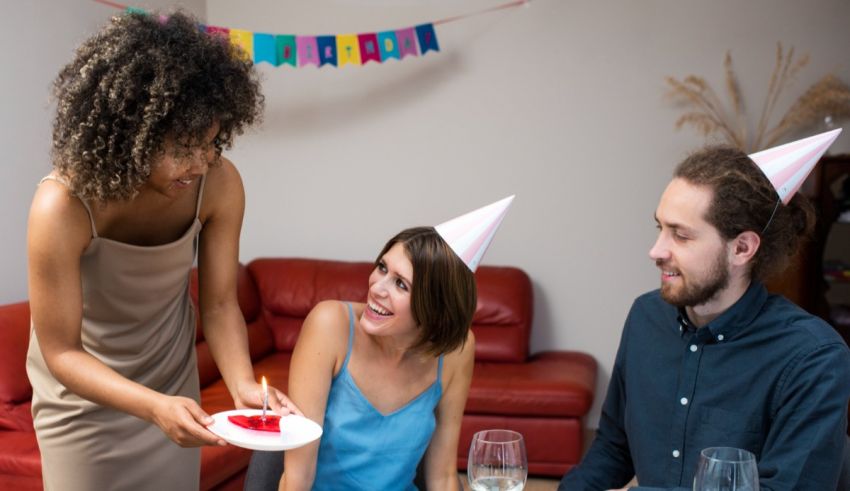 A group of people at a birthday party.
