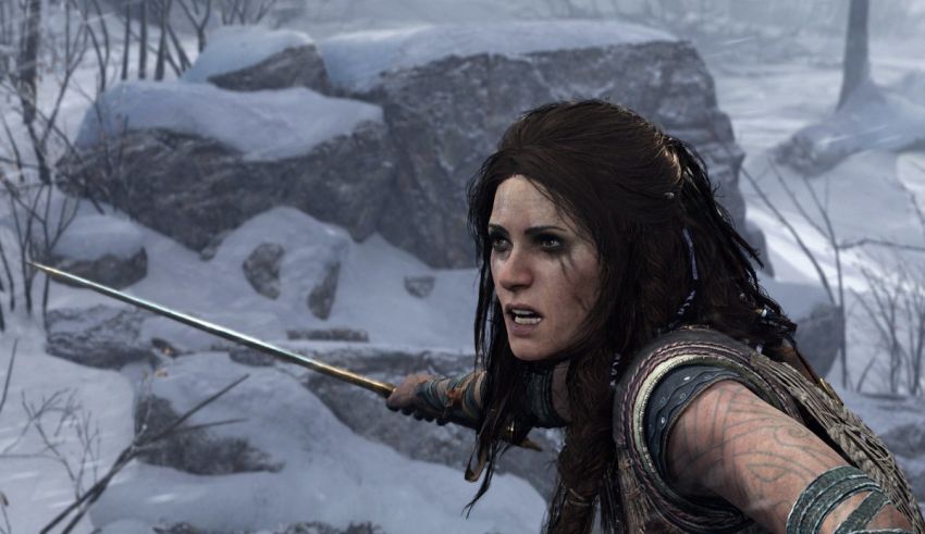 A woman is holding a sword in the snow.