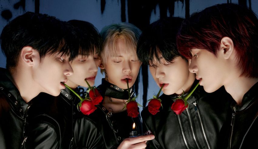 A group of young men in leather jackets holding roses.