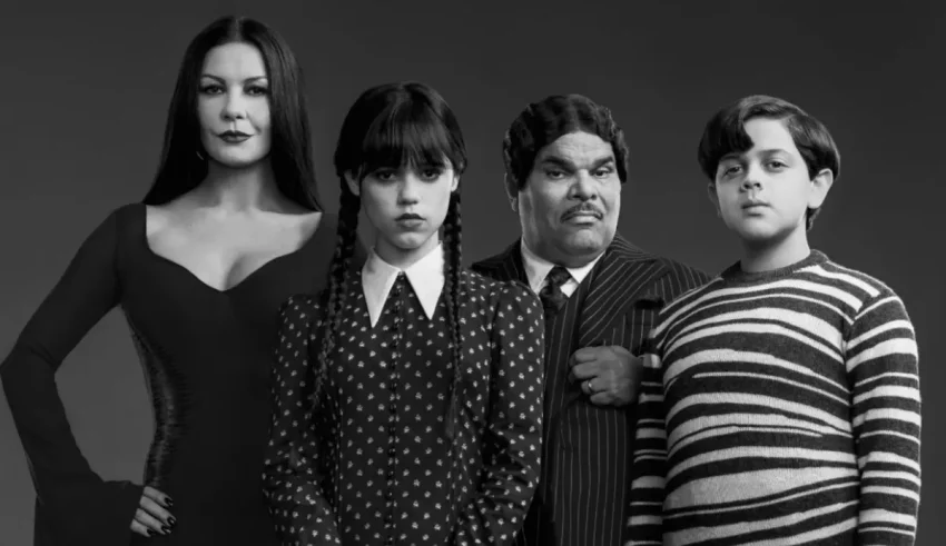 The addams family in a black and white photo.