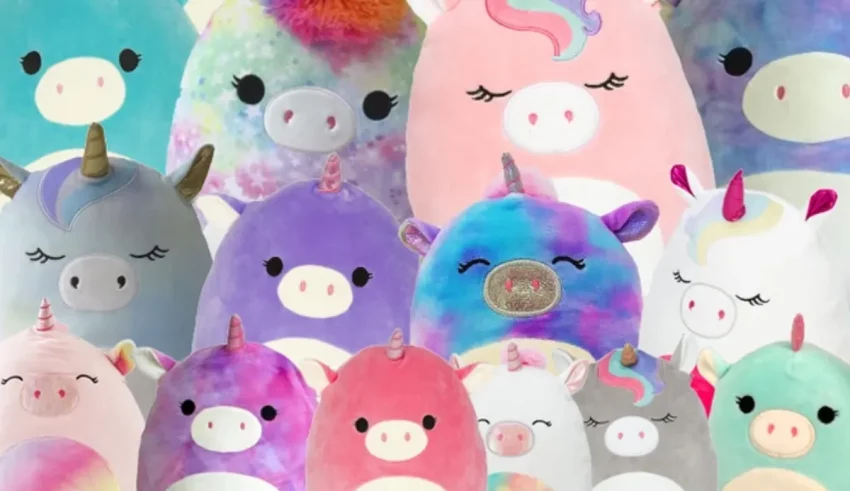 A group of colorful unicorn stuffed animals.