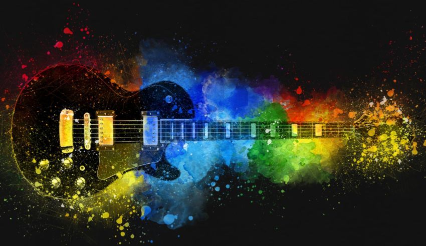 An electric guitar with colorful paint splatters on a black background.