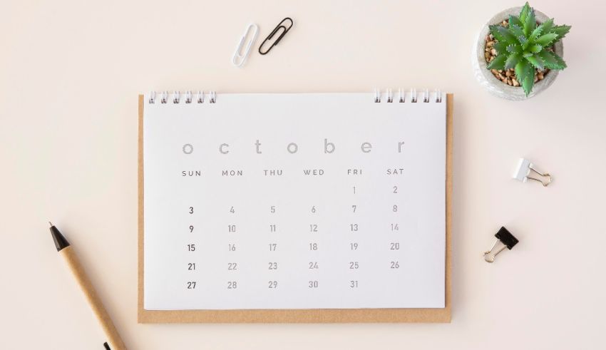 An october calendar on a beige background.