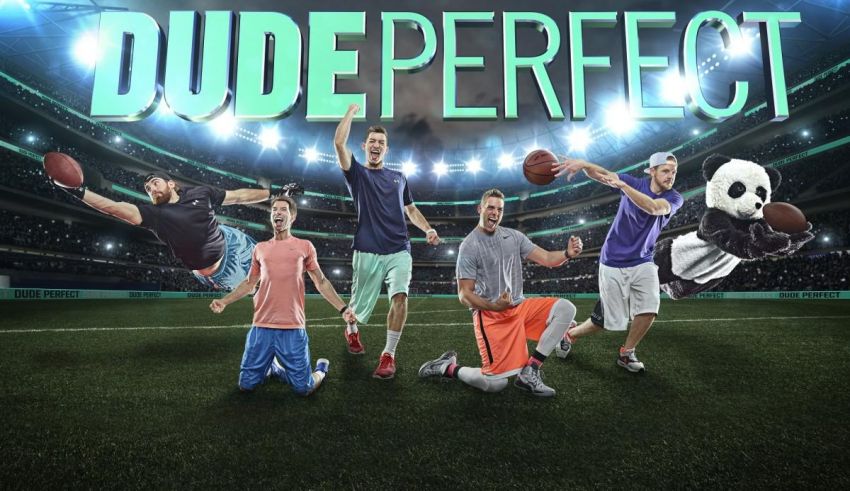 A group of people in a stadium with the words dude perfect.